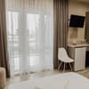 Отель REEF Hotel. Делюкс двухместный с террасой 14