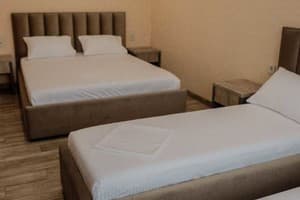 Отель REEF Hotel. Семейный 4-местный люкс 2