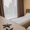Отель REEF Hotel. Семейный 4-местный люкс 9